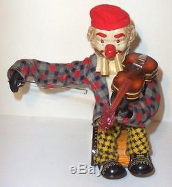 1950's BATTERY OPERATED HAPPY FIDDLER CLOWN MUSICAL TIN LITHO TOY very nice