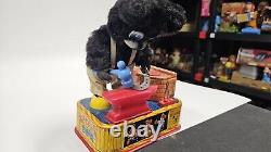 1950's Battery Operated Tin Litho Blacksmith Bear Working