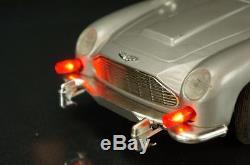 1960's Gilbert Aston Martin James Bond 007 Battery Op Tin Spy Car Original Box