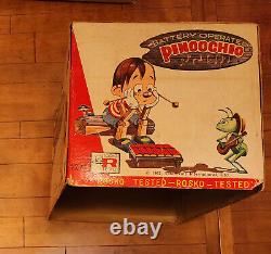 1960's Rosko Tin Battery Operated Pinocchio Xylophone Playing Toy in Box Japan