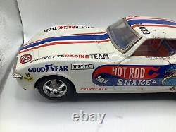 1970's Corvette Hot Rod Snake & Red Cyclone Bump-N-Go Tin Litho Car