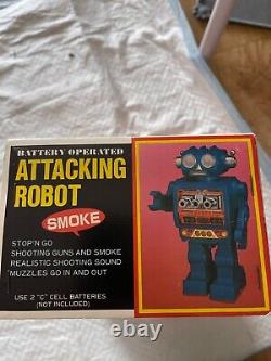 Attacking Robot Smoke made in japan battery operated with original box. Nice toy