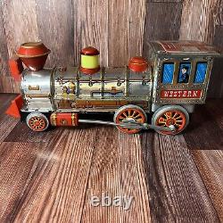 BATTERY OPERATED MYSTERY ACTION SILVER WESTERN SPECIAL LOCOMOTIVE TIN TRAIN Read