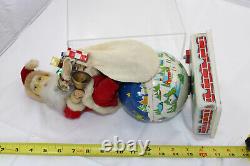 Battery Operated Toy Santa on Rotating Globe