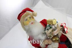 Battery Operated Toy Santa on Rotating Globe