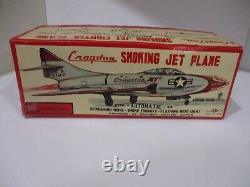 COUGAR SMOKING JET FIGHTER- boxed- BATTERY OPERATED -EXCELLENT COND-JAPAN-WORKS