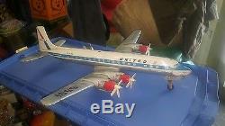 CRAGSTAN YONEZAWA DC-7C MAINLINER PLANE BATTERY OPERATED With ESCALATOR SUPER RARE