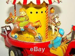 MERRY GO ROUND TRUCK MADE IN 50s BY T-N COMPANY IN JAPAN. SEE IT ON VIDEO
