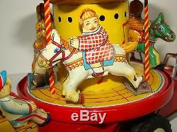 MERRY GO ROUND TRUCK MADE IN 50s BY T-N COMPANY IN JAPAN. SEE IT ON VIDEO