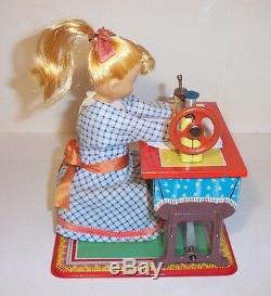 MINT 1950's BATTERY OPERATED DOLLY SEAMSTRESS TIN LITHO SEWING MACHINE TOY MIB