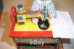 MINT 1950's BATTERY OPERATED DOLLY SEAMSTRESS TIN LITHO SEWING MACHINE TOY MIB
