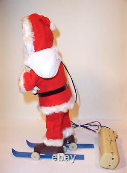 MINT 1950's BATTERY OPERATED JOLLY SANTA CLAUS ON SNOW TIN LITHO CHRISTMAS TOY