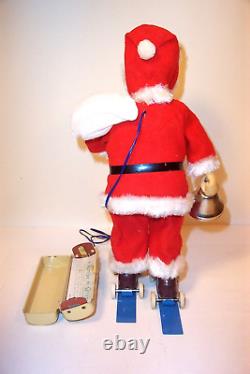 MINT 1950's BATTERY OPERATED JOLLY SANTA CLAUS ON SNOW TIN LITHO CHRISTMAS TOY
