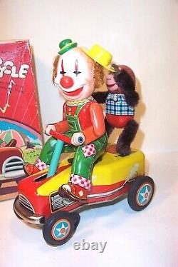 MINT 1950's BATTERY OPERATED PIERROT-MONKEY CYCLE TIN LITHO CIRCUS CLOWN TOY