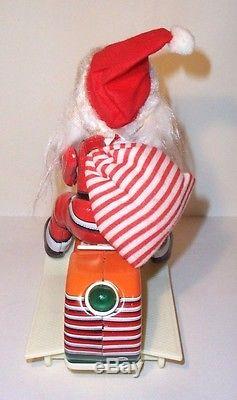 MINT 1950's BATTERY OPERATED SANTA CLAUS ON SCOOTER TIN LITHO CHRISTMAS TOY MIB