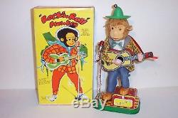 MINT 1950s BATTERY OPERATED ROCK'N' ROLL MONKEY TIN LITHO TOY GIBSON GUITAR MIB