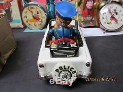 MYSTERY POLICE CAR BATTERY OPERATED IN BOX JAPAN NEAR MINT TIN LITHO WORKS 50's