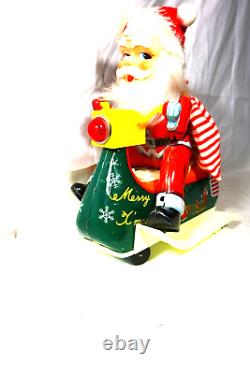 Modern Toys Japanese Battery Operated Bump N Tin Toy Santa Claus On A Snowmobile