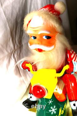 Modern Toys Japanese Battery Operated Bump N Tin Toy Santa Claus On A Snowmobile