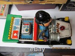 POLICE PATROL CAR #5 BATTERY OPERATED IN BOX 1950's EXC WORKS NOMURA JAPAN