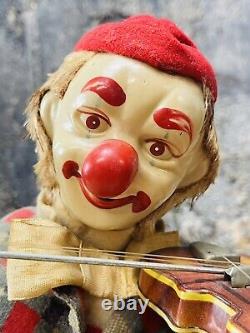 RARE 1950's BATTERY OPERATED HAPPY FIDDLER VIOLIN CLOWN TIN LITHO TOY ALPS