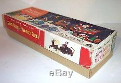 RARE MIB 1950s SANTA CLAUS ON REINDEER SLEIGH BATTERY OPERATED TIN LITHO MINT