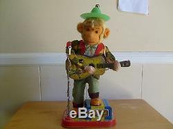 Rock N Roll Monkey with box, Batteryoperated tin toy, works