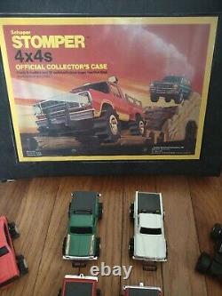 Schaper Stomper 4x4's Official Collectors Case with tires 8 trucks and paperwork