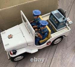 TN NOMURA BATTERY OPERATED POLICE JEEP LARGE 37cm STILL IN THE ORIGINAL BOX