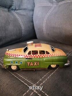 Tin Battery Operated Toy Taxi, Electromobile, Japan. 8.5L untested