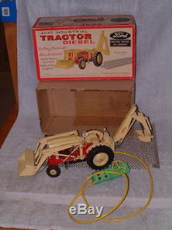 VINTAGE CRAGSTAN, TIN, B/O 4040 DIESEL FORD TRACTOR WithBOX. FULLY WORKING! COOL