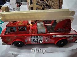 VINTAGE JAPANESE S. H. TIN LITHO BATTERY OP FIRE ENGINE WithMYSTERY ACTION & BOX