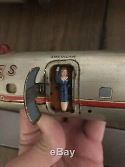 VINTAGE battery Op 1950s Japan tin toy AMERICAN AIRLINES DC7 plane by YONEZAWA