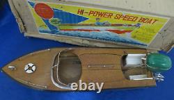 Vintage 1950's Wooden 12 Boat With Electric Motor Marked Japan on boat & motor