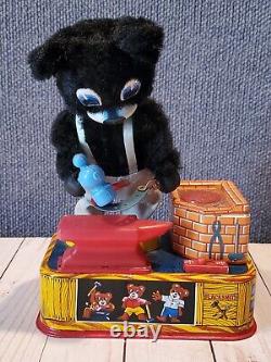 Vintage A1 IOB Blacksmith Bear with Horseshoe Battery Operated Tin Litho Toy