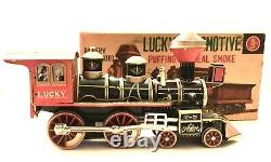 Vintage Battery Operated Puffing Out Real Smoke Lucky Locomotive Tin Train Mint