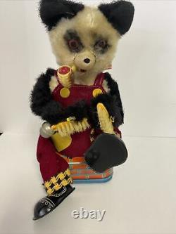 Vintage Battery Operated Smoking And Shoe Shining Panda Bear Tin Toy With box