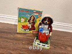 Vintage Battery Powered Lady Pup Tending Her Garden Cragstan Toy READ DESCRIPT