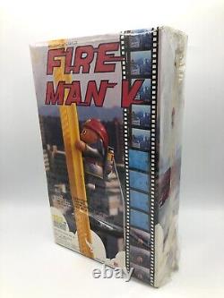 Vintage FIRE MAN V Climbing Fireman Battery Operated Toy Taiwan SEALED from 1984