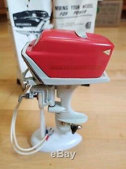 Vintage K&O 1957 Scott Atwater Toy Outboard Motor withStand and Sheet