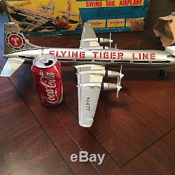Vintage Marx swing tail battery operated FLYING TIGER toy airplane, MINT in box