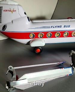 Vintage Modern Toys Masudaya Tin Japan Battery Flying Bus Helicopter Door Opens