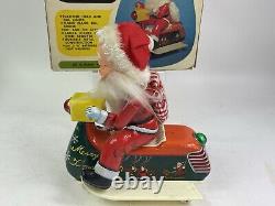 Vintage Santa Claus on Scooter Tin Litho Battery Operated Christmas Toy With Box