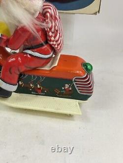 Vintage Santa Claus on Scooter Tin Litho Battery Operated Christmas Toy With Box