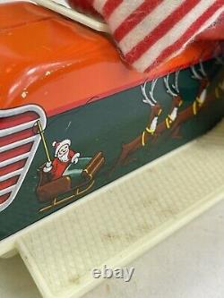 Vintage Santa Claus on Scooter Tin Litho Battery Operated Christmas Toy With Box