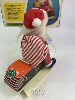 Vintage Santa Claus on Scooter Tin Litho Battery Operated Christmas Toy With Box