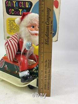 Vintage Santa Claus on Scooter Tin Litho Battery Operated Christmas Toy With Box