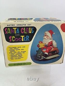 Vintage Santa Claus on Scooter Tin Litho Battery Operated Christmas Toy With Box