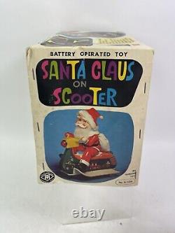 Vintage Santa Claus on Scooter Tin Litho Battery Operated Christmas Toy With Box