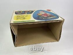 Vintage Santa Claus on Scooter Tin Litho Battery Operated Christmas Toy With Box